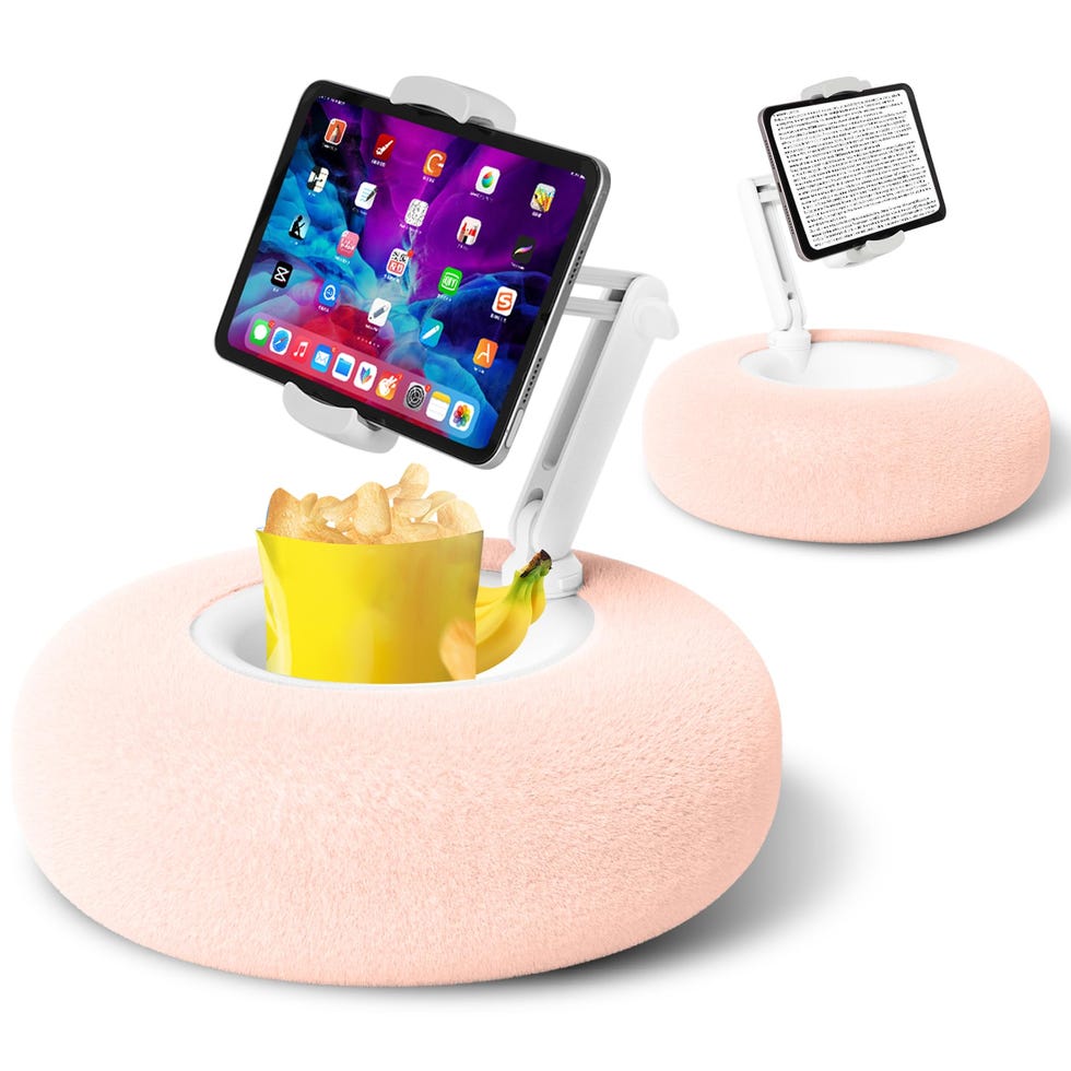 Pink tablet pillow stand showing adjustable arm and snack bowl